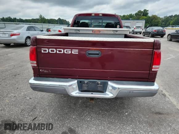 2000 Dodge Dakota Sport z VIN 1B7GG26N5YS650791, wystawiony jako Copart lot #63601765 z przebiegiem 80 841 mil mil oraz Szkoda całkowita • Salvage title. Historia ofert i sprzedaży dostępna na DreamBid. Obrazek 6.