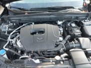 ✅ 2025 Mazda CX-50 S Premium • VIN: 7MMVABDM1SN381665 • Lot: 43696524. Wystawiony na IAAI z przebiegiem 5 789 mil. Bezpłatny archiwum sprzedaży aukcyjnych z USA i szczegółowy raport historii pojazdu na DreamBid. Zdjęcie 10.