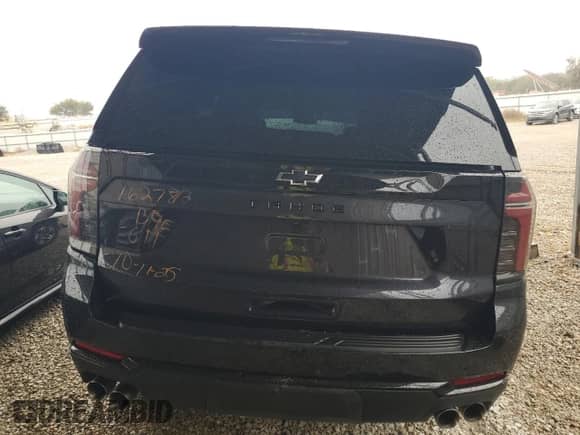 2025 Chevrolet Tahoe Z71 z VIN 1GNS6PRD5SR266643, wystawiony jako Copart lot #90061725 z przebiegiem Nie podano mil oraz Czysty tytuł • Clean title. Historia ofert i sprzedaży dostępna na DreamBid. Obrazek 6.