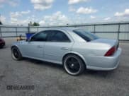 ✅ 2001 Lincoln LS • VIN: 1LNHM87AX1Y736723 • Лот: 64463665. Опубликован ранее на Copart с пробегом 150 533 миль. Бесплатный доступ к архиву аукционных продаж из США и подробный отчёт об истории автомобиля на DreamBid. Изображение 2.