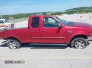 ✅ 1999 Ford F-150 • VIN: 1FTRX18W1XKB97650 • Lot: 42572056. Wystawiony na IAAI z przebiegiem Nie podano. Bezpłatny archiwum sprzedaży aukcyjnych z USA i szczegółowy raport historii pojazdu na DreamBid. Zdjęcie 12.