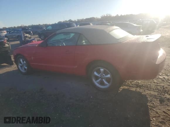 ✅ 2007 Ford Mustang Deluxe • VIN: 1ZVHT84N175251411 • Lot: 87271085. Listed on Copart with 82,989 mi. Free auction sales archive from the USA and detailed vehicle history report at DreamBid. Image 2.