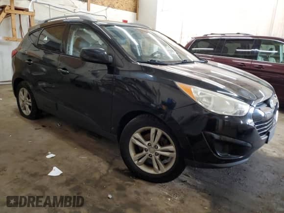 2011 Hyundai Tucson GLS z VIN KM8JUCACXBU307959, wystawiony jako Copart lot #67553525 z przebiegiem 171 724 mil mil oraz Nie do naprawy • Non repairable. Historia ofert i sprzedaży dostępna na DreamBid. Obrazek 4.
