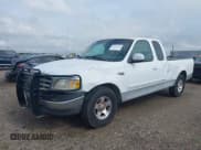 ✅ 2000 Ford F-150 XL • VIN: 1FTZX1720YNC40664 • Лот: 42109556. Опубликован ранее на IAAI с пробегом Не указан. Бесплатный доступ к архиву аукционных продаж из США и подробный отчёт об истории автомобиля на DreamBid. Изображение 2.