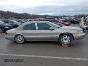 ✅ 2001 Lincoln Continental • VIN: 1LNHM97VX1Y627039 • Lot: 41482016. Listed on IAAI with 143,317 mi. Free auction sales archive from the USA and detailed vehicle history report at DreamBid. Image 13.