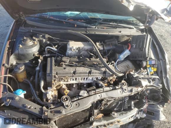 2002 Hyundai Elantra GT z VIN KMHDN55D92U046610, wystawiony jako Copart lot #80125494 z przebiegiem Nie podano mil oraz Szkoda całkowita • Salvage title. Historia ofert i sprzedaży dostępna na DreamBid. Obrazek 11.