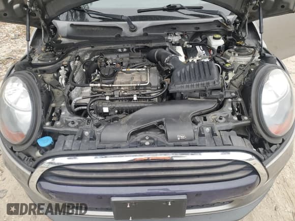 ✅ 2017 MINI Hardtop 4 Door Cooper • VIN: WMWXU1C51H2E17627 • Лот: 90085175. Опубликован ранее на Copart с пробегом 62 148 миль. Бесплатный доступ к архиву аукционных продаж из США и подробный отчёт об истории автомобиля на DreamBid. Изображение 11.