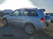 ✅ 2003 Toyota RAV4 • VIN: JTEGH20V830107215 • Лот: 94493765. Опубликован ранее на Copart с пробегом 252 429 миль. Бесплатный доступ к архиву аукционных продаж из США и подробный отчёт об истории автомобиля на DreamBid. Изображение 2.