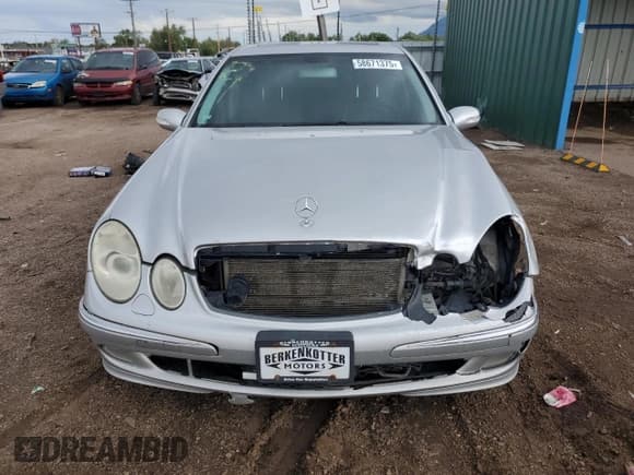 ✅ 2005 Mercedes-Benz E 500 • VIN: WDBUF83J85X167643 • Lot: 58671375. Listed on Copart with 195,835 mi. Free auction sales archive from the USA and detailed vehicle history report at DreamBid. Image 5.