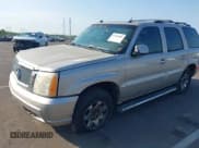✅ 2004 Cadillac Escalade • VIN: 1GYEK63N14R200973 • Lot: 42926800. Listed on IAAI with 261,068 mi. Free auction sales archive from the USA and detailed vehicle history report at DreamBid. Image 2.