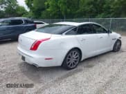✅ 2012 Jaguar XJ • VIN: SAJWA1CB8CLV29047 • Lot: 42434378. Listed on IAAI with 102,605 mi. Free auction sales archive from the USA and detailed vehicle history report at DreamBid. Image 4.