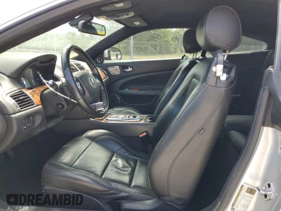 ✅ 2011 Jaguar XK XKR • VIN: SAJWA4DC3BMB42457 • Lot: 61157735. Listed on Copart with 128,452 mi. Free auction sales archive from the USA and detailed vehicle history report at DreamBid. Image 7.