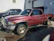 2001 Dodge 1500 z VIN 1B7HF13Z51J292550, wystawiony jako Copart lot #77139774 z przebiegiem 291 671 mil mil oraz Szkoda całkowita • Salvage title. Historia ofert i sprzedaży dostępna na DreamBid. Obrazek 1.
