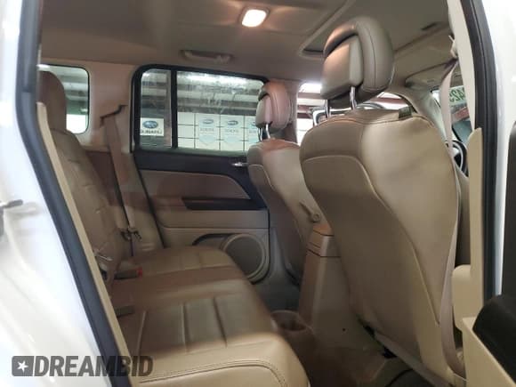 ✅ 2015 Jeep Patriot High Altitude • VIN: 1C4NJPFA0FD157556 • Lot: 55453425. Listed on Copart with 97,409 mi. Free auction sales archive from the USA and detailed vehicle history report at DreamBid. Image 11.