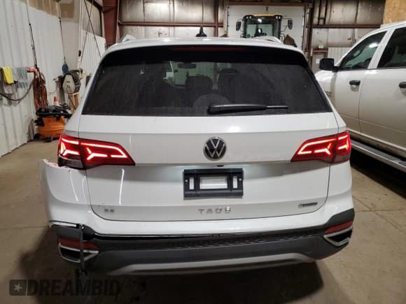✅ 2023 Volkswagen Taos SE • VIN: 3VVYX7B21PM313105 • Лот: 89555315. Опубликован ранее на Copart с пробегом 24 431 миль. Бесплатный доступ к архиву аукционных продаж из США и подробный отчёт об истории автомобиля на DreamBid. Изображение 6.