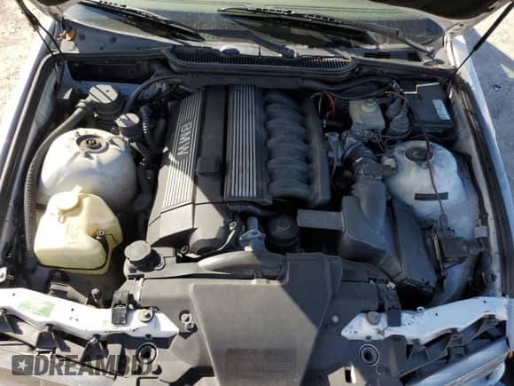 1998 BMW 3 Series 328i with VIN WBACD4322WAV64531, listed as a Copart auction lot 47091785 with 394,082 mi miles and Salvage title. Bid and sale history available at DreamBid. Image 11.