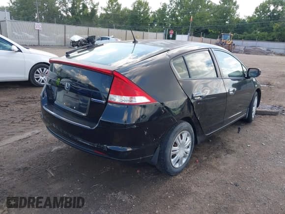 ✅ 2011 Honda Insight LX • VIN: JHMZE2H59BS000024 • Лот: 42957798. Опубликован ранее на IAAI с пробегом Не указан. Бесплатный доступ к архиву аукционных продаж из США и подробный отчёт об истории автомобиля на DreamBid. Изображение 4.