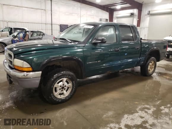 ✅ 2002 Dodge Dakota SLT • VIN: 1B7HG48N42S725145 • Lot: 82690584. Wystawiony na Copart z przebiegiem 159 161 mil. Bezpłatny archiwum sprzedaży aukcyjnych z USA i szczegółowy raport historii pojazdu na DreamBid. Zdjęcie 1.