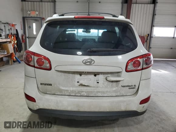 ✅ 2011 Hyundai Santa Fe SE • VIN: 5XYZHDAG5BG046293 • Lot: 82055114. Listed on Copart with 245,922 mi. Free auction sales archive from the USA and detailed vehicle history report at DreamBid. Image 6.