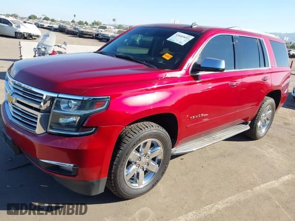 ✅ 2015 Chevrolet Tahoe LTZ • VIN: 1GNSCCKC2FR216758 • Lot: 43689893. Listed on IAAI with 184,851 mi. Free auction sales archive from the USA and detailed vehicle history report at DreamBid. Image 2.