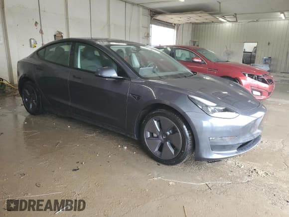 ✅ 2023 Tesla Model 3 Long Range • VIN: 5YJ3E1EBXPF706600 • Lot: 59021995. Wystawiony na Copart z przebiegiem 20 295 mil. Bezpłatny archiwum sprzedaży aukcyjnych z USA i szczegółowy raport historii pojazdu na DreamBid. Zdjęcie 4.