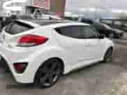 2015 Hyundai Veloster Turbo z VIN KMHTC6AE3FU228606, wystawiony jako Copart lot #48008524 z przebiegiem 103 559 mil mil oraz . Historia ofert i sprzedaży dostępna na DreamBid. Obrazek 4.
