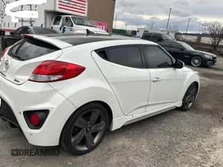 2015 Hyundai Veloster Turbo z VIN KMHTC6AE3FU228606, wystawiony jako Copart lot #48008524 z przebiegiem 103 559 mil mil oraz . Historia ofert i sprzedaży dostępna na DreamBid. Obrazek 4.