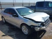 ✅ 2011 Ford Fusion Hybrid • VIN: 3FADP0L32BR345235 • Lot: 42322127. Listed on IAAI with 120,968 mi. Free auction sales archive from the USA and detailed vehicle history report at DreamBid. Image 1.