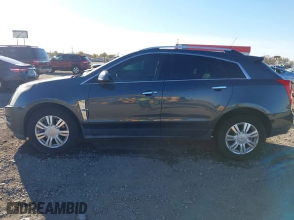 ✅ 2012 Cadillac SRX Luxury Collection • VIN: 3GYFNAE38CS628173 • Lot: 43592875. Wystawiony na IAAI z przebiegiem 83 888 mil. Bezpłatny archiwum sprzedaży aukcyjnych z USA i szczegółowy raport historii pojazdu na DreamBid. Zdjęcie 14.
