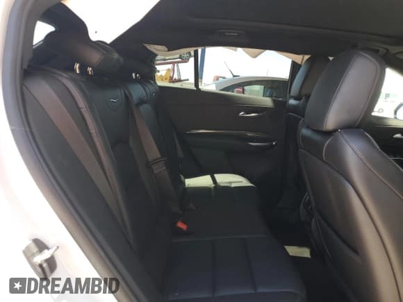 ✅ 2023 Cadillac XT4 AWD Sport • VIN: 1GYFZFR40PF211337 • Лот: 57353945. Опубликован ранее на Copart с пробегом 23 497 миль. Бесплатный доступ к архиву аукционных продаж из США и подробный отчёт об истории автомобиля на DreamBid. Изображение 11.