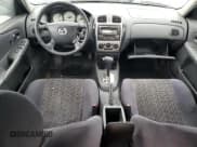 ✅ 2001 Mazda Protege LX • VIN: JM1BJ226510402231 • Lot: 46717595. Wystawiony na Copart z przebiegiem 154 138 mil. Bezpłatny archiwum sprzedaży aukcyjnych z USA i szczegółowy raport historii pojazdu na DreamBid. Zdjęcie 8.