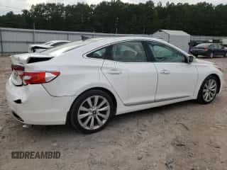 2014 Hyundai Azera Limited z VIN KMHFH4JGXEA382945, wystawiony jako Copart lot #71667754 z przebiegiem 91 056 mil mil oraz Szkoda całkowita • Salvage title. Historia ofert i sprzedaży dostępna na DreamBid. Obrazek 3.