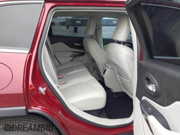 ✅ 2021 Jeep Cherokee 80th Anniversary • VIN: 1C4PJMMX1MD200569 • Lot: 42975007. Listed on IAAI with 79,573 mi. Free auction sales archive from the USA and detailed vehicle history report at DreamBid. Image 8.