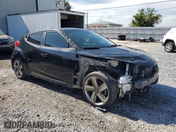 2013 Hyundai Veloster Turbo с VIN KMHTC6AE8DU178833, выставлен на аукционе Copart как лот 61944125 с пробегом 149 564 миль миль и Списание • Salvage title. История ставок и продаж доступна на DreamBid. Изображение 4.