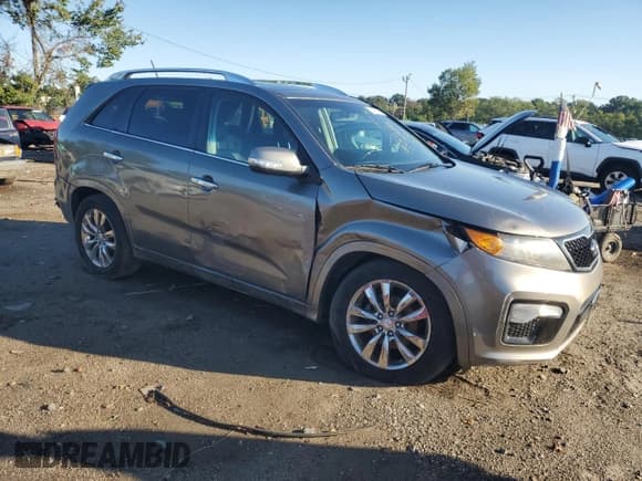 ✅ 2012 Kia Sorento SX • VIN: 5XYKWDA28CG190479 • Lot: 71405785. Listed on Copart with 110,870 mi. Free auction sales archive from the USA and detailed vehicle history report at DreamBid. Image 4.