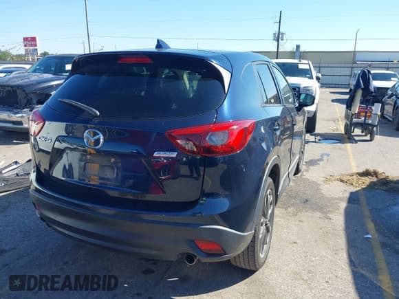 ✅ 2016 Mazda CX-5 Grand Touring • VIN: JM3KE2DY7G0848772 • Лот: 43587656. Опубликован ранее на IAAI с пробегом 85 056 миль. Бесплатный доступ к архиву аукционных продаж из США и подробный отчёт об истории автомобиля на DreamBid. Изображение 4.