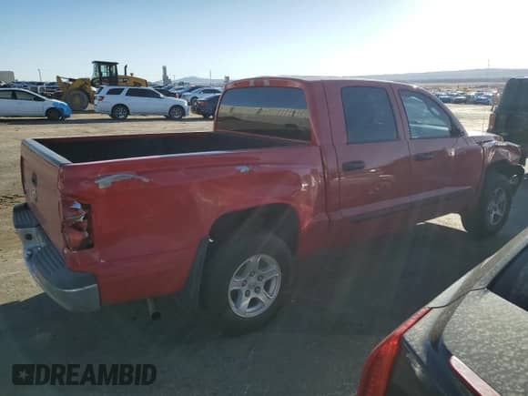 2006 Dodge Dakota SLT с VIN 1D7HE48K26S517725, выставлен на аукционе Copart как лот 48126085 с пробегом 252 671 миль миль и Списание • Salvage title. История ставок и продаж доступна на DreamBid. Изображение 3.
