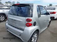✅ 2009 Smart fortwo Pure • VIN: WMEEJ31X39K285621 • Лот: 43298780. Опубликован ранее на IAAI с пробегом 148 496 миль. Бесплатный доступ к архиву аукционных продаж из США и подробный отчёт об истории автомобиля на DreamBid. Изображение 4.