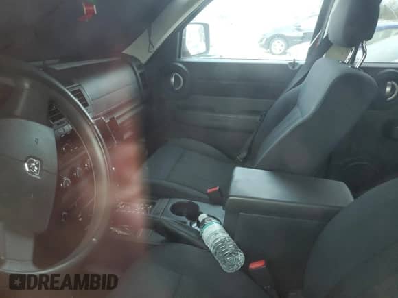 2011 Dodge Nitro Heat z VIN 1D4PT4GK9BW606971, wystawiony jako Copart lot #78386584 z przebiegiem Nie podano mil oraz Szkoda całkowita • Salvage title. Historia ofert i sprzedaży dostępna na DreamBid. Obrazek 8.