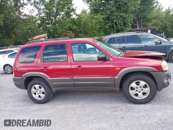 ✅ 2003 Mazda Tribute ES • VIN: 4F2CZ961X3KM16718 • Lot: 42734760. Wystawiony na IAAI z przebiegiem 89 108 mil. Bezpłatny archiwum sprzedaży aukcyjnych z USA i szczegółowy raport historii pojazdu na DreamBid. Zdjęcie 14.
