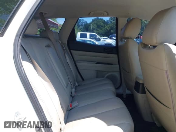 ✅ 2010 Mazda CX-7 SV • VIN: JM3ER2W50A0340428 • Лот: 42914805. Опубликован ранее на IAAI с пробегом 194 272 миль. Бесплатный доступ к архиву аукционных продаж из США и подробный отчёт об истории автомобиля на DreamBid. Изображение 8.