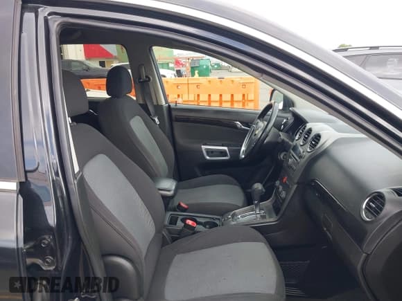 ✅ 2013 Chevrolet Captiva Sport LS • VIN: 3GNAL2EK8DS599463 • Lot: 41640921. Wystawiony na IAAI z przebiegiem 163 789 mil. Bezpłatny archiwum sprzedaży aukcyjnych z USA i szczegółowy raport historii pojazdu na DreamBid. Zdjęcie 5.