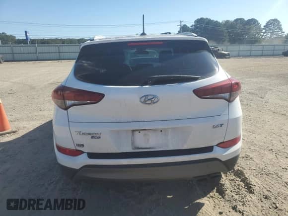 2016 Hyundai Tucson Sport with VIN KM8J33A26GU242125, listed as a Copart auction lot 82364965 with 101,227 mi miles and Clean title. Bid and sale history available at DreamBid. Image 6.