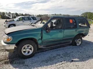 1998 Ford Explorer XLT z VIN 1FMZU32P8WZA15594, wystawiony jako Copart lot #69445705 z przebiegiem Nie podano mil oraz Szkoda całkowita • Salvage title. Historia ofert i sprzedaży dostępna na DreamBid. Obrazek 1.