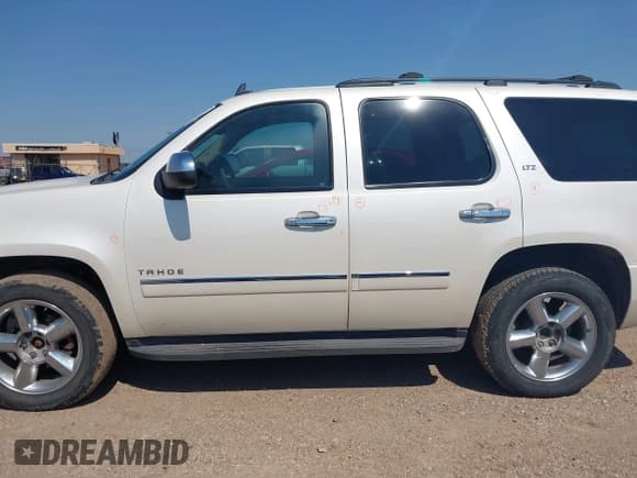 ✅ 2013 Chevrolet Tahoe LTZ • VIN: 1GNSKCE04DR331475 • Lot: 42897009. Listed on IAAI with 178,454 mi. Free auction sales archive from the USA and detailed vehicle history report at DreamBid. Image 14.