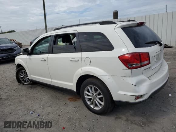 ✅ 2014 Dodge Journey SXT • VIN: 3C4PDCBG4ET140996 • Lot: 70204894. Listed on Copart with 94,668 mi. Free auction sales archive from the USA and detailed vehicle history report at DreamBid. Image 2.