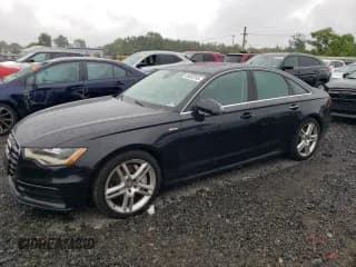 ✅ 2015 Audi A6 Prestige • VIN: WAUHGAFC2FN034875 • Lot: 68002265. Listed on Copart with 143,690 mi. Free auction sales archive from the USA and detailed vehicle history report at DreamBid. Image 1.