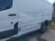 ✅ 2016 Ford Transit Cargo • VIN: 1FTYR1YM0GKA86155 • Lot: 41840237. Listed on IAAI with 192,125 mi. Free auction sales archive from the USA and detailed vehicle history report at DreamBid. Image 20.