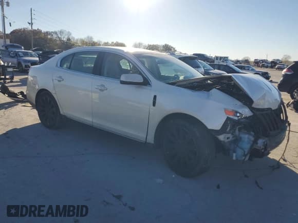 ✅ 2011 Lincoln MKS • VIN: 1LNHL9DR7BG608322 • Lot: 91708745. Listed on Copart with 217,374 mi. Free auction sales archive from the USA and detailed vehicle history report at DreamBid. Image 4.