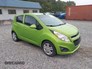 ✅ 2014 Chevrolet Spark LS • VIN: KL8CB6S90EC510630 • Lot: 43373863. Listed on IAAI with 117,924 mi. Free auction sales archive from the USA and detailed vehicle history report at DreamBid. Image 1.